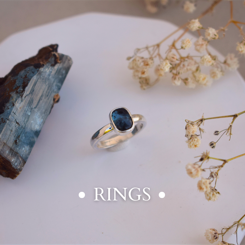 moonstone silver ring on prop stand