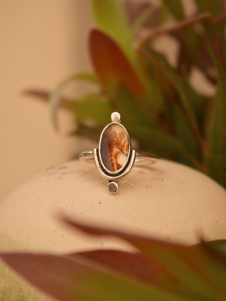 moonstone silver ring on prop stand