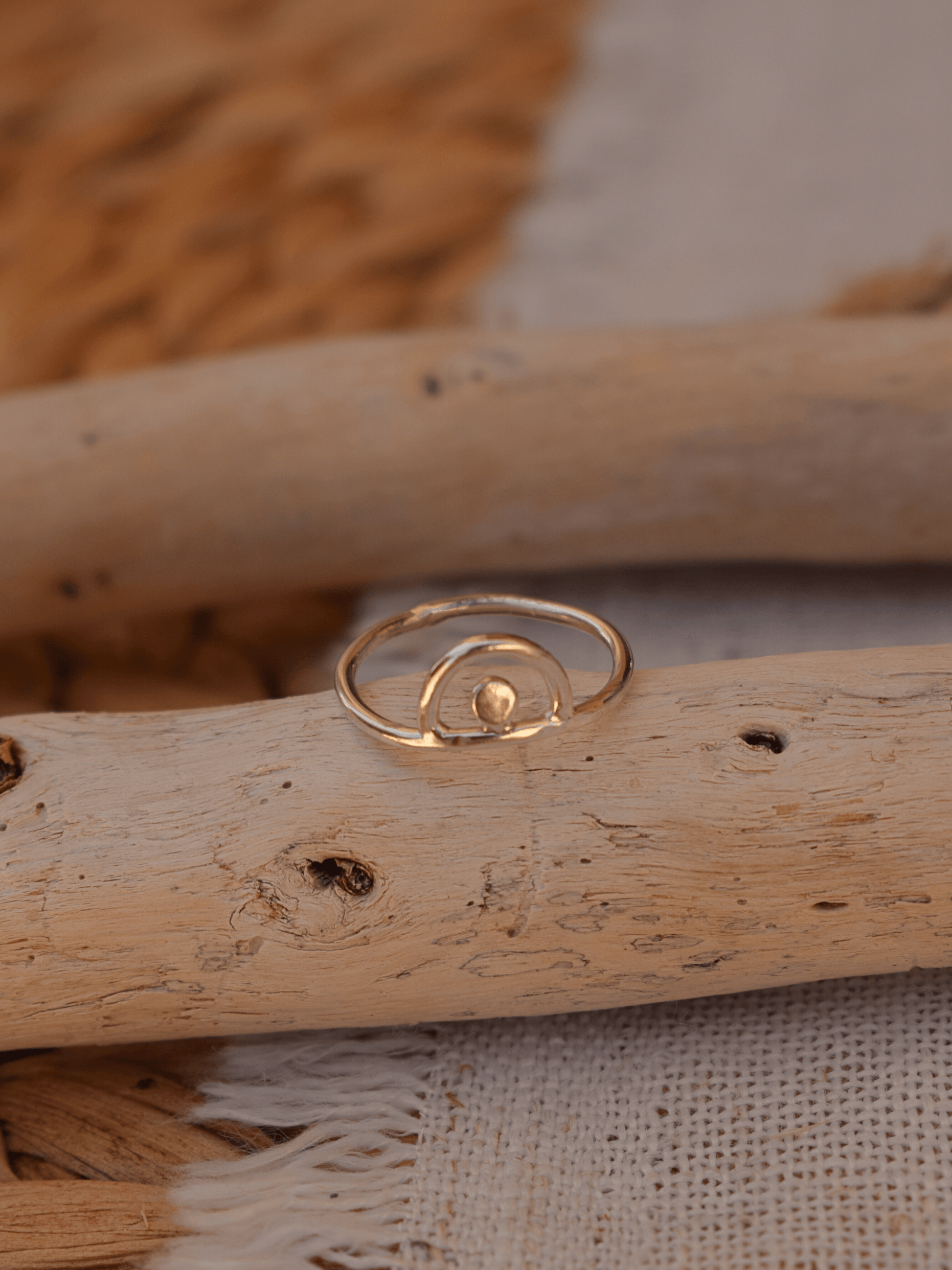 sterling silver ring on drift wood