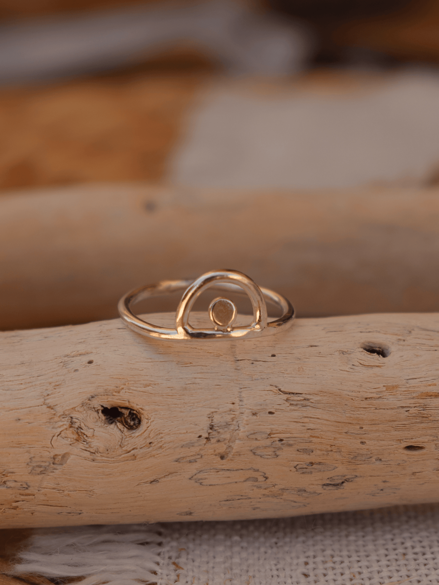 sterling silver ring on drift wood