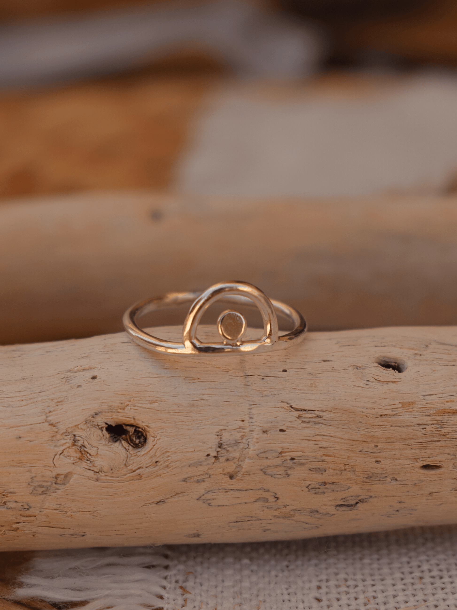 sterling silver ring on drift wood